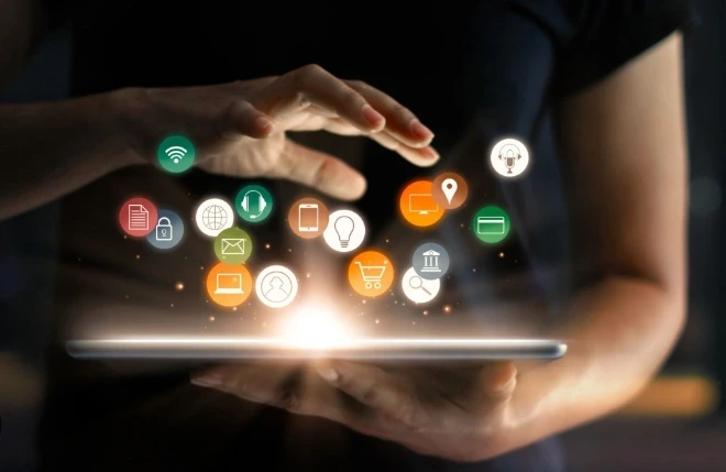 Digital Marketing Contribution to Business Growth Digital Marketing Contribution to Business Growth,A person holding a digital tablet with glowing icons floating above it, symbolizing digital marketing tools, online services, and modern technology integration.